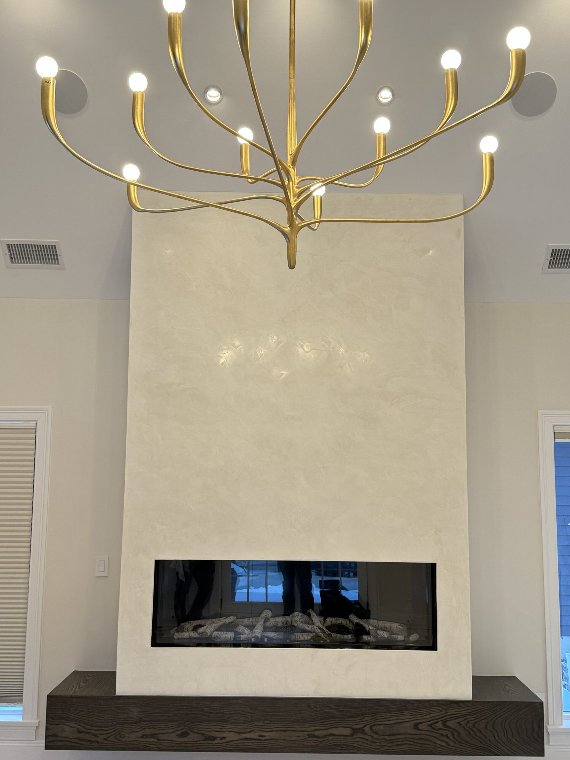 Custom Venetian plaster fireplace by EM Design Painting